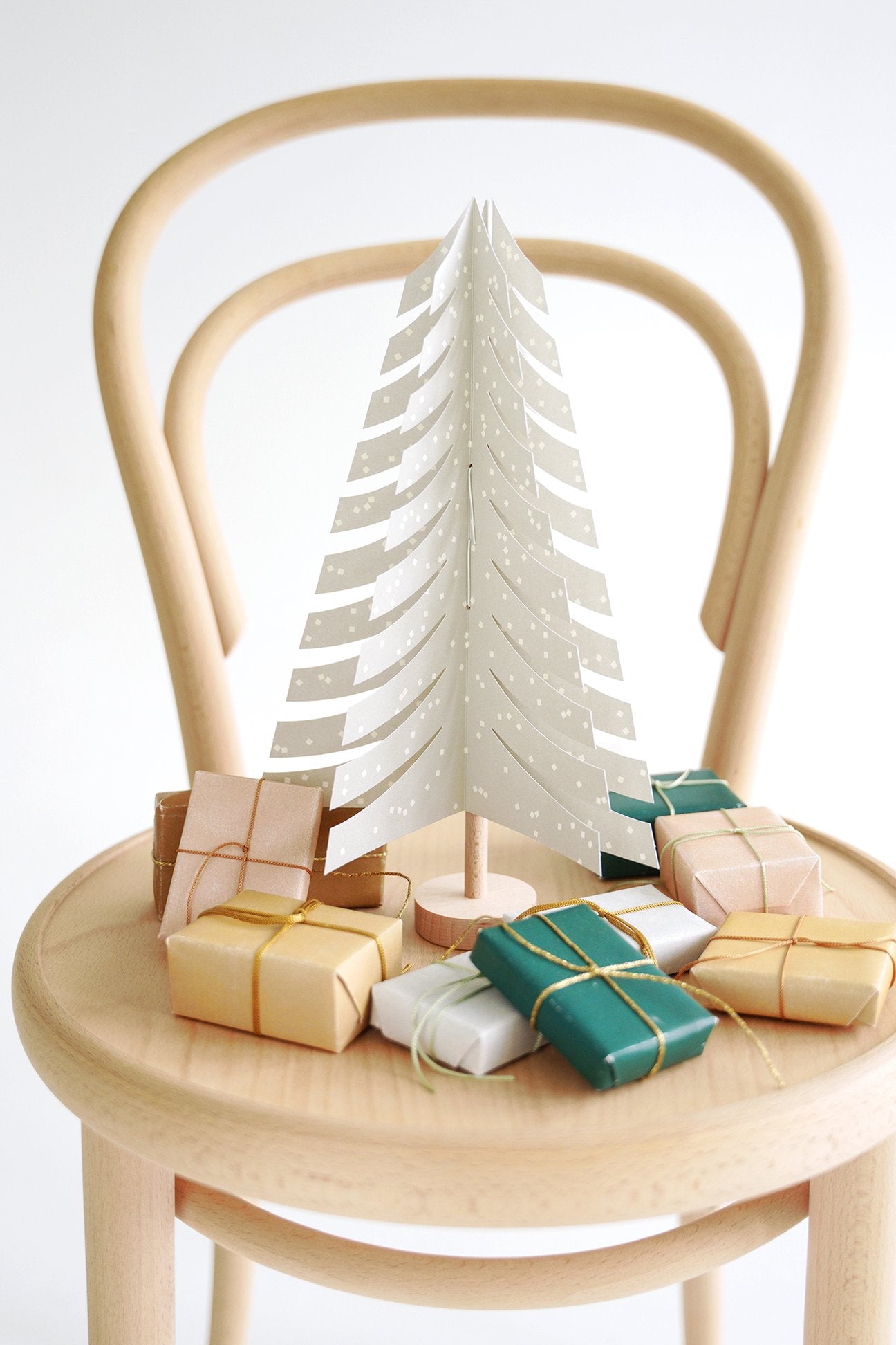 Wood and paper FIR tree decoration in light grey