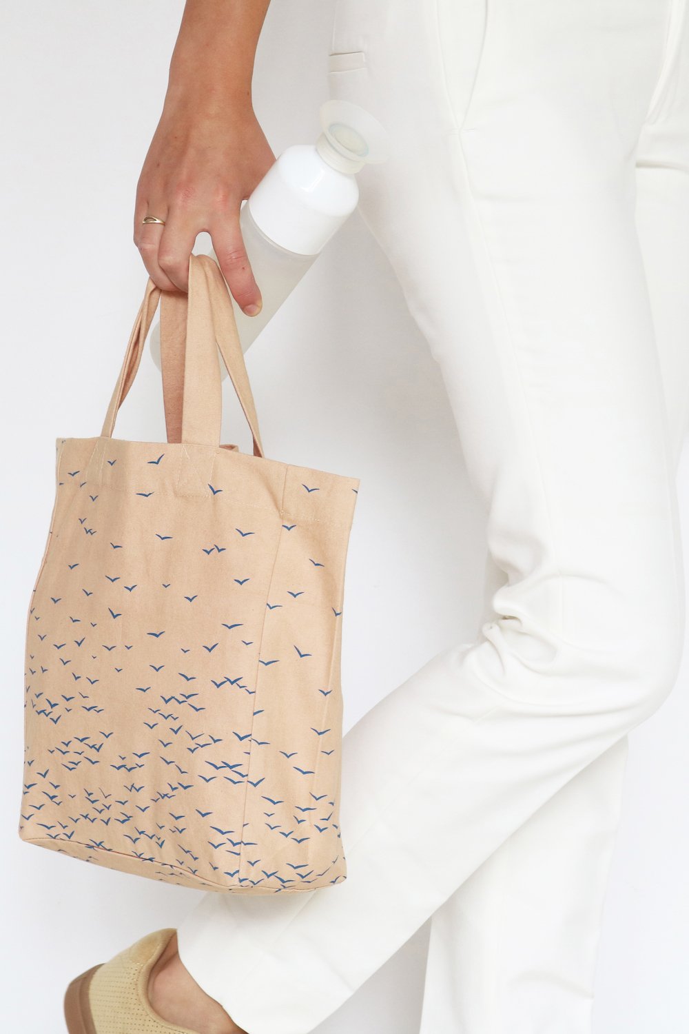 SKY - small fairtrade, organic cotton tote bag in apricot