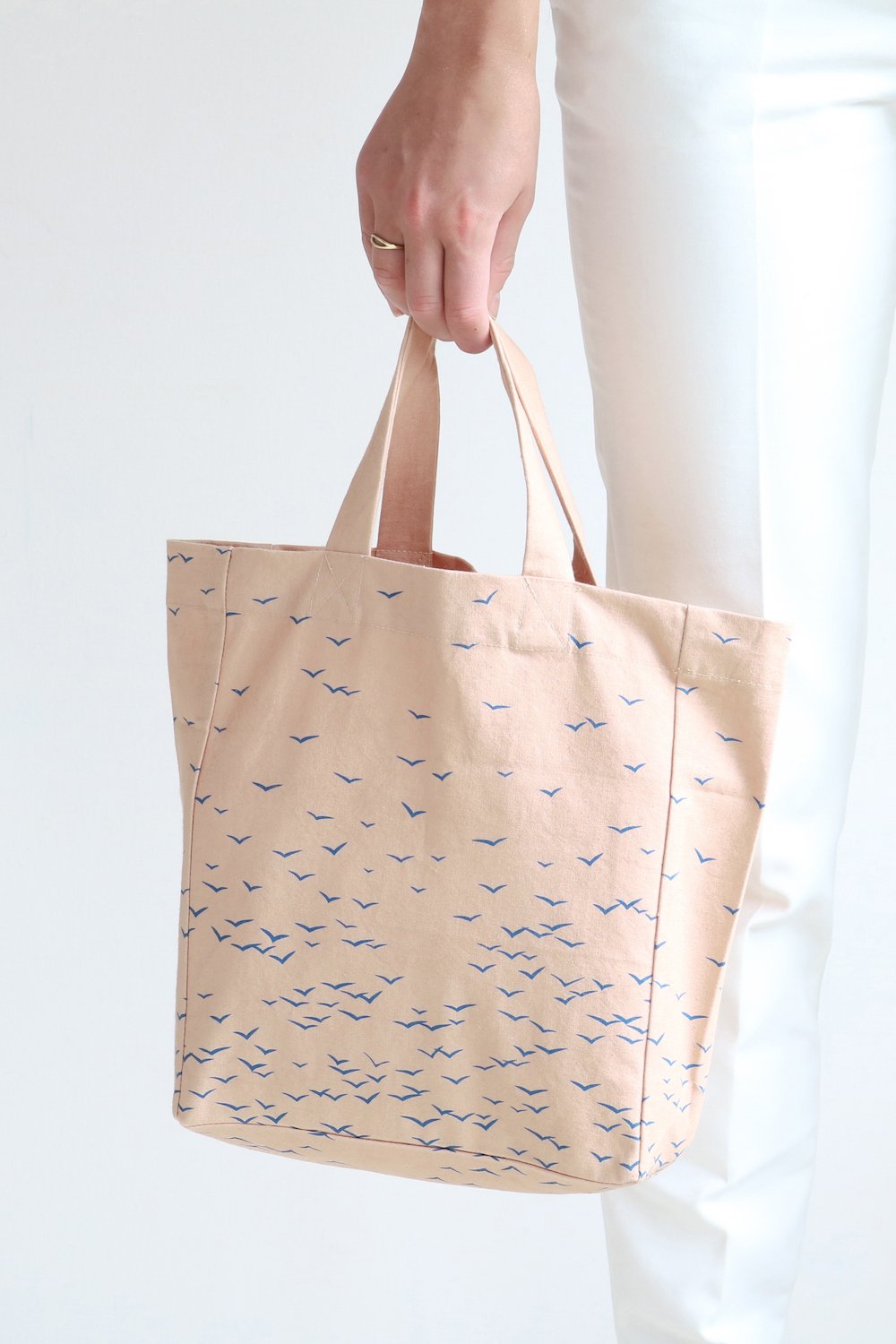 SKY - small fairtrade, organic cotton tote bag in apricot