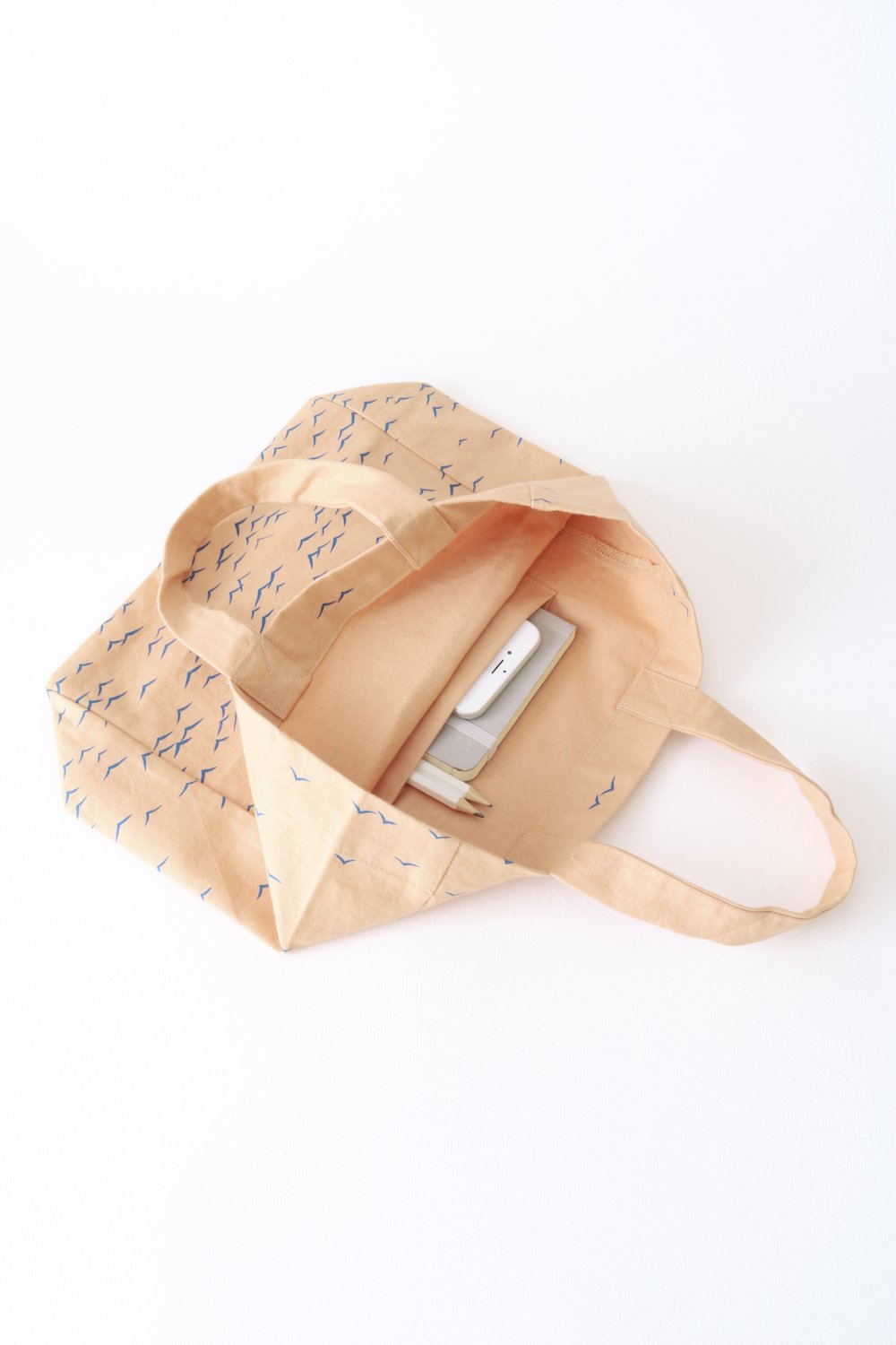 SKY - small fairtrade, organic cotton tote bag in apricot